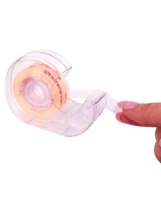 Clear plastic adhesive tape dispenser with tape being pulled out by a finger.
